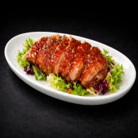 Pato frito en salsa dulce semipicante